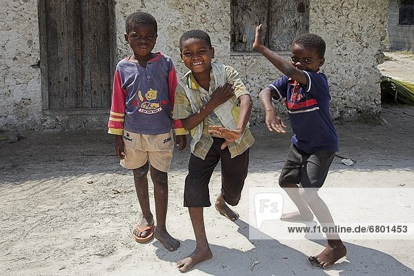 Zanzibar  Tanzania  Children Smiling At Camera