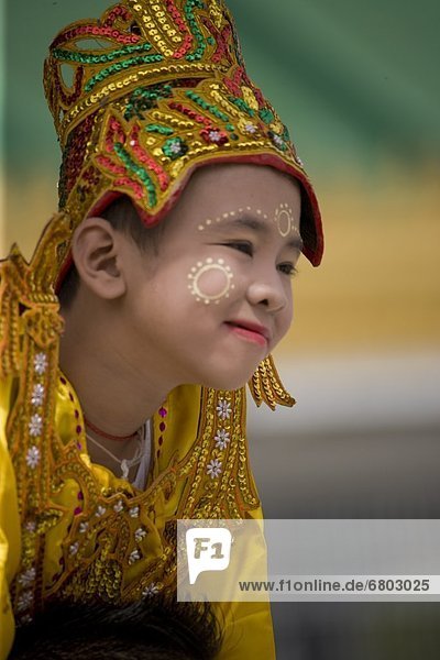 Young Boy At The Shin Pyu Festival  Rangoon Yangon Myanmar
