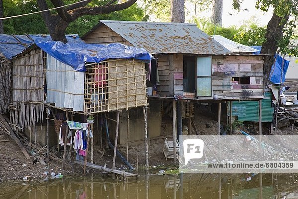 Houses On A River In Cambodia