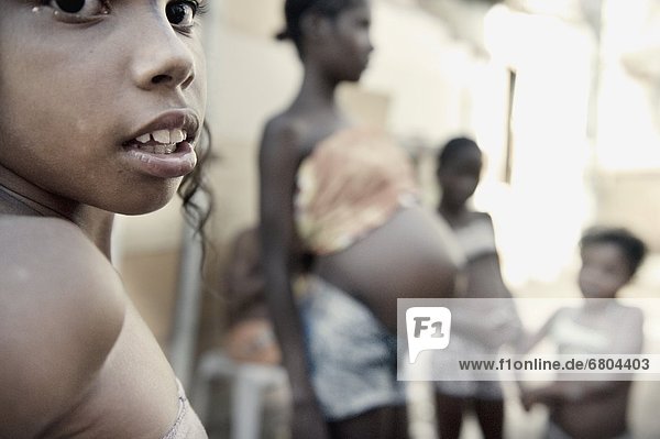Child With Pregnant Woman In Background  Bahia  Brazil