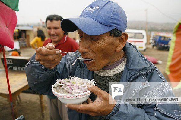 Man Eating Soup  Lima  Peru