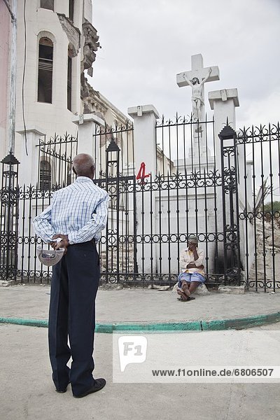 The Cross Still Stands Through The Church Being Destroyed In The Earthquake As The Parishioners Still Come To Seek God For Answers And Consolation  Port-Au-Prince  Haiti