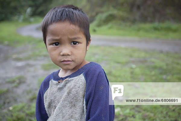 Außenaufnahme  Portrait  Junge - Person  jung  philippinisch  Philippinen  freie Natur