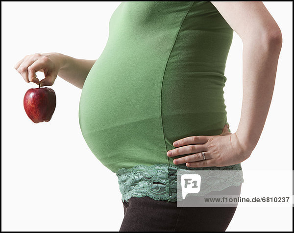 Frau  halten  Schwangerschaft  rot  Apfel