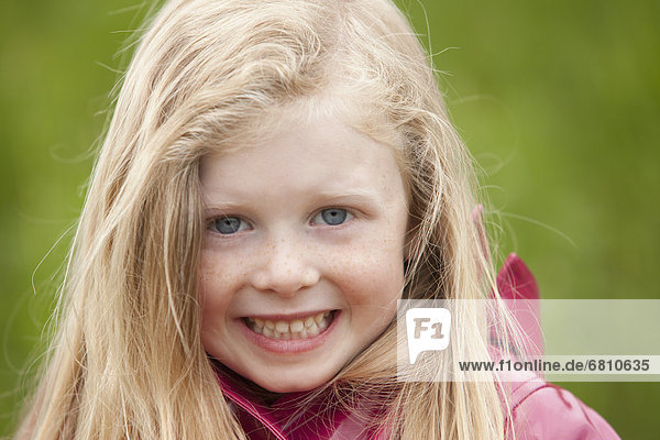 Portrait of smiling blonde girl
