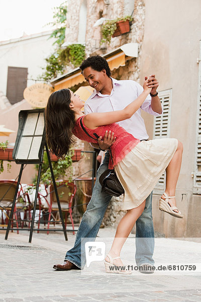 France  Cassis  Couple dancing on street