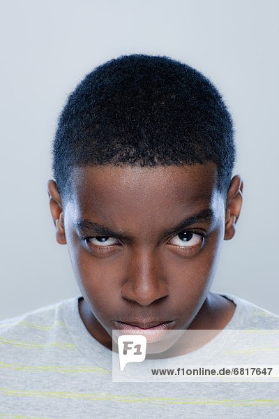 Portrait of teenage boy (14-15)  studio shot