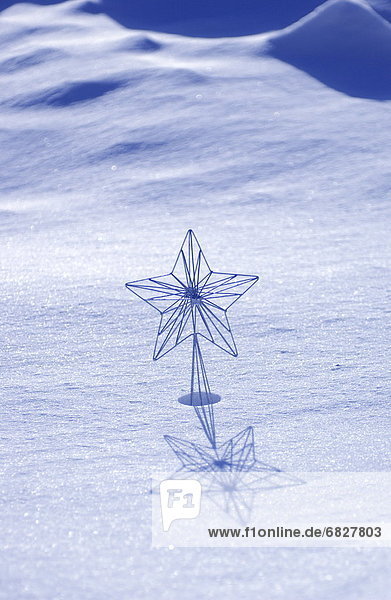 Star decoration in snow