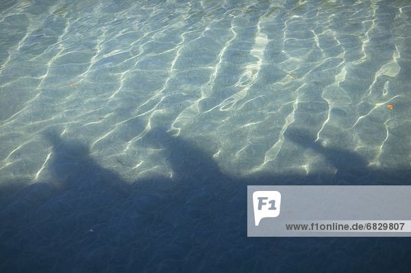 Surface of sea reflecting people's shadow  full frame  Shimoda city  Shizuoka prefecture  Japan