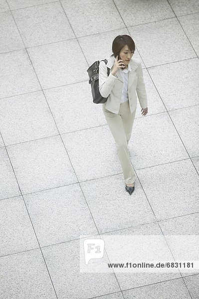 Businesswoman on cell phone  High Angle View