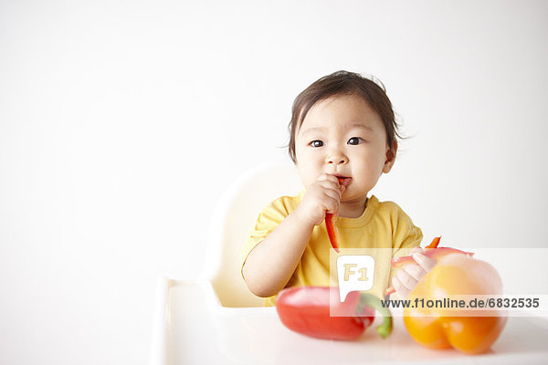 Baby Boy Eating Bell Pepper