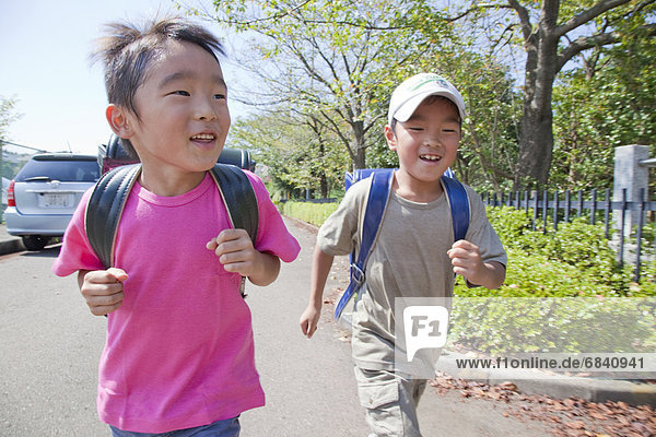 Boys walking   Tokyo Prefecture  Honshu  Japan