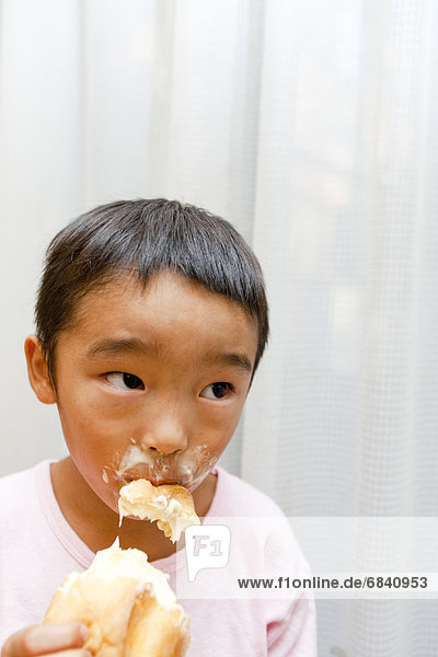 Boy eating ice cream  Japan