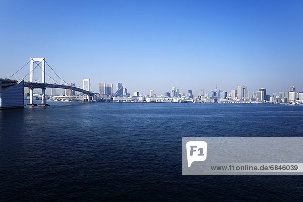 The Rainbow Bridge and Tokyo city during the day. Minato Ward  Tokyo Prefecture  Japan