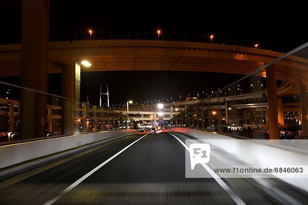 Car point of view of a highway road at night. Kanagawa Prefecture  Japan