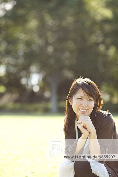 Portrait of young woman smiling  Japan