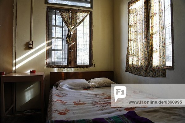 Bedroom With Bed and Sunlight  Taungkok  Myanmar