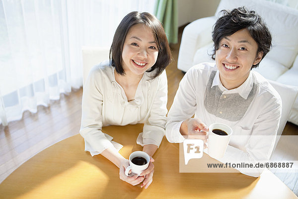 Young Couple Drinking Coffee