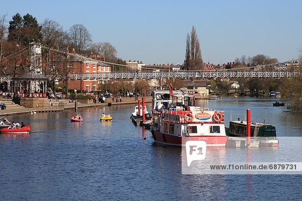Boats and suspension bridge over the River Dee  Chester  Cheshire  England  United Kingdom  Europe