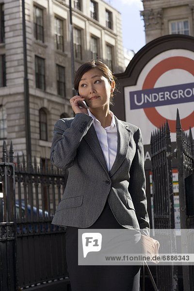 Businesswoman Outside Underground Station