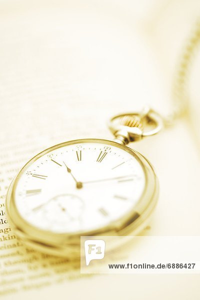 Pocket Watch and Book