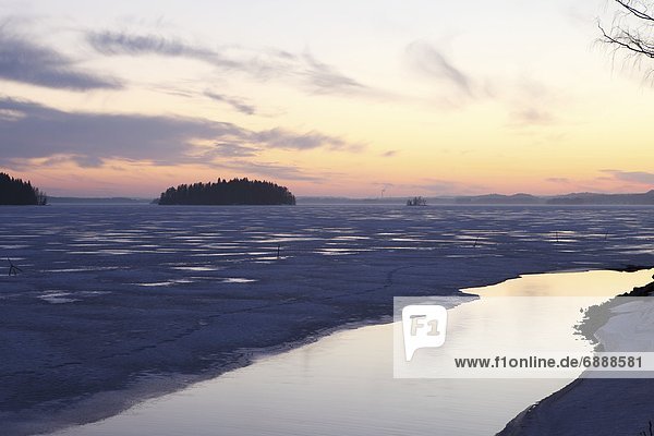 Bodenhöhe  Europa  Sonnenuntergang  über  See  Finnland  gefroren  Skandinavien
