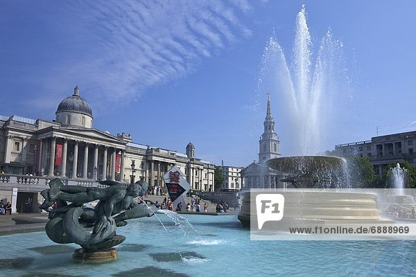 Tritons and dolphin fountain with the Olympic digital countdown clock and the National Gallery  Trafalgar Square  London  England  United Kingdom  Europe