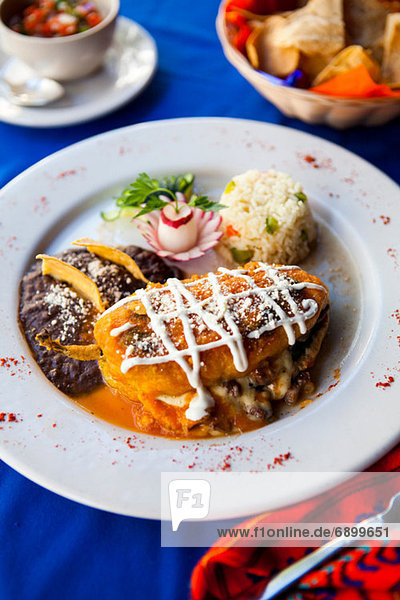 Traditional Mayan dish of stuffed pepper with rice and beans