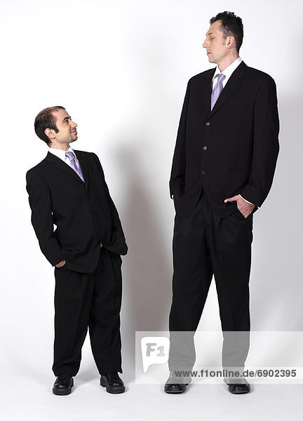 Short and Tall Businessmen