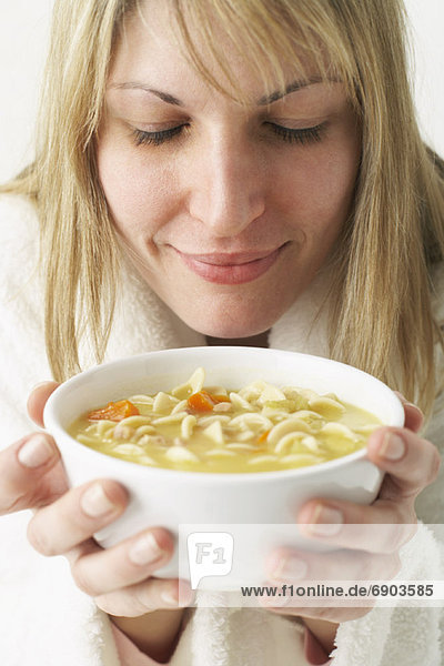 Woman with Chicken Noodle Soup
