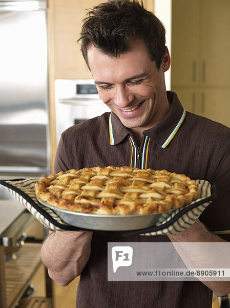 Man Holding Pie