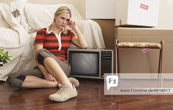 Woman Sitting in New Home