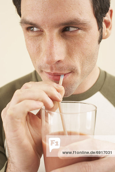 Man Drinking Chocolate Milk