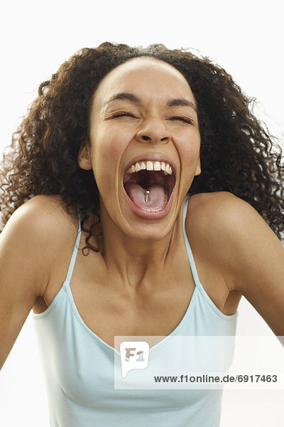 Portrait of Woman with Pierced Tongue Laughing