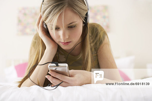 zuhören  Schlafzimmer  Spiel  MP3-Player  MP3 Spieler  MP3 Player  MP3-Spieler  Mädchen