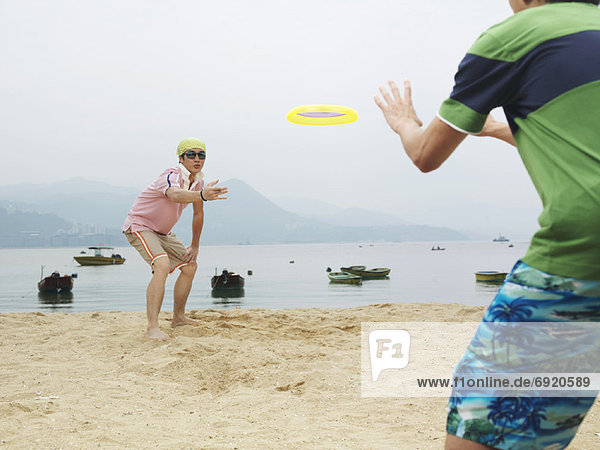 Mensch  Menschen  Strand  Frisbee  spielen