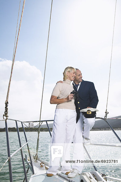 Couple Standing on Boat