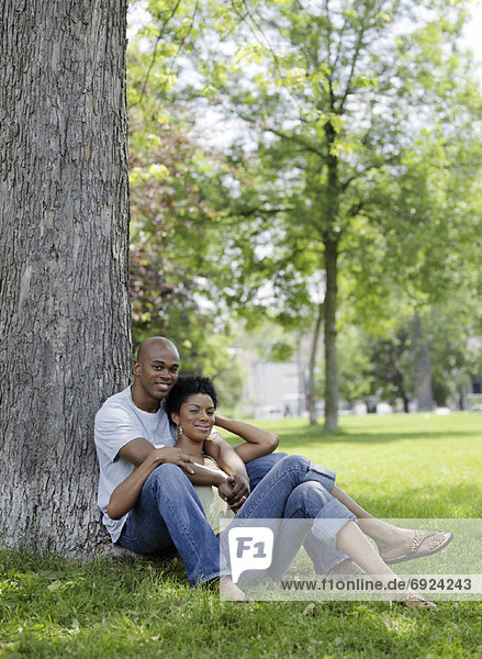 Couple Sitting in Park