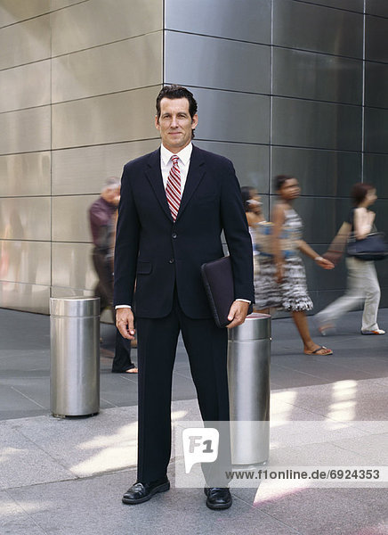 Portrait of Businessman Standing Outdoors