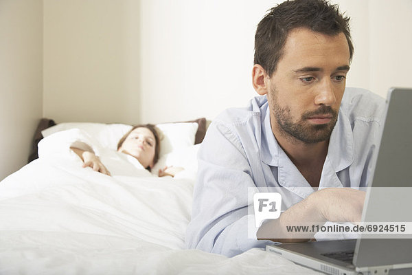 Man Using Laptop Computer