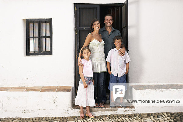 Portrait of Family in Doorway