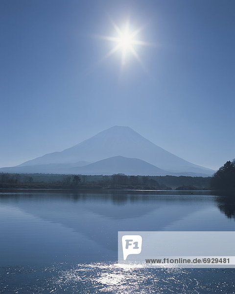 Mt. Fuji from Lake Shoji  lens flare  Yamanashi prefecture  Japan