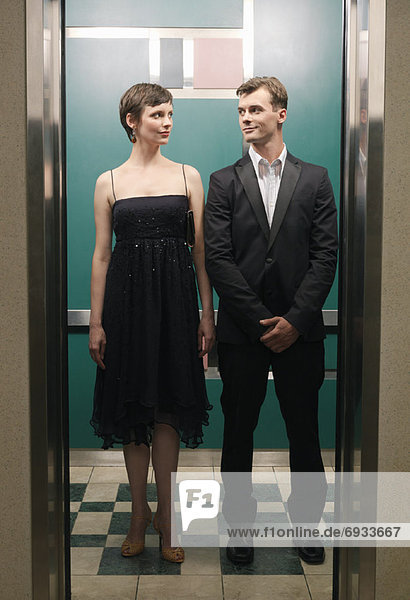 Portrait of Couple in Elevator