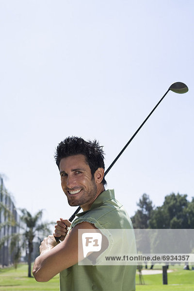 Portrait of Golfer with Golf Club