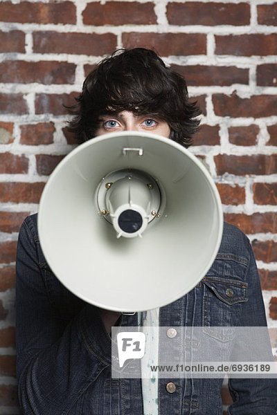 Young Man Holding Megaphone