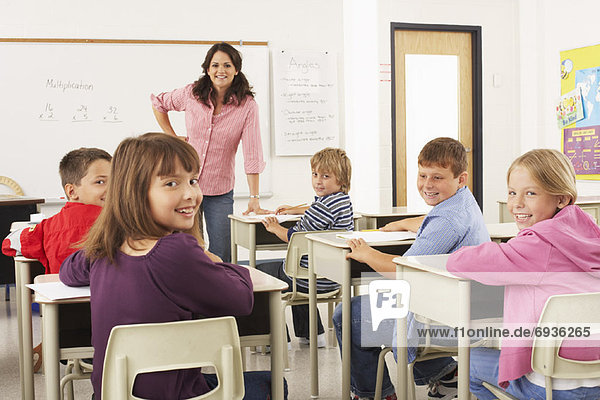 Students and Teacher in Classroom