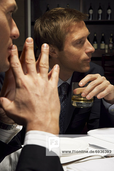 Men Talking Over Drinks