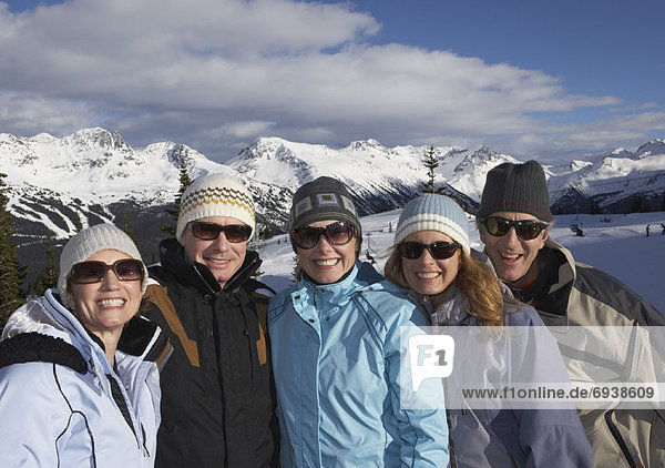 Friends on Top of Ski Hill  Whistler  BC  Canada