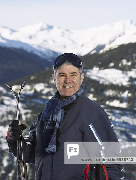 Portrait of Man with Skis