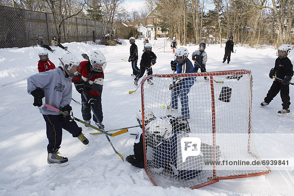 Children Playing Hockey